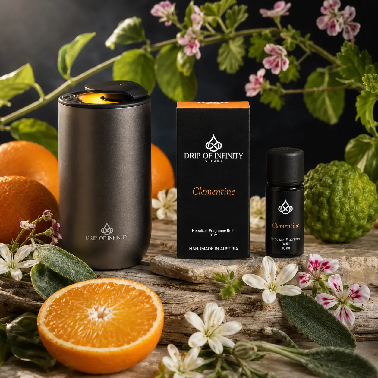 Drip of Infinity Clementine Nebulizer Set mit Diffuser, Flasche und Verpackung mit frischen Clementinen und Zitrusnoten